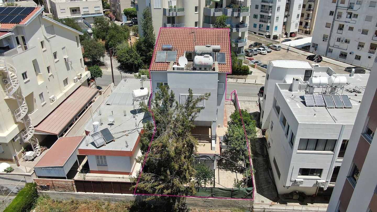 Three storey semi-detached mixed use building with shop in Strovolos, Nicosia photo 4