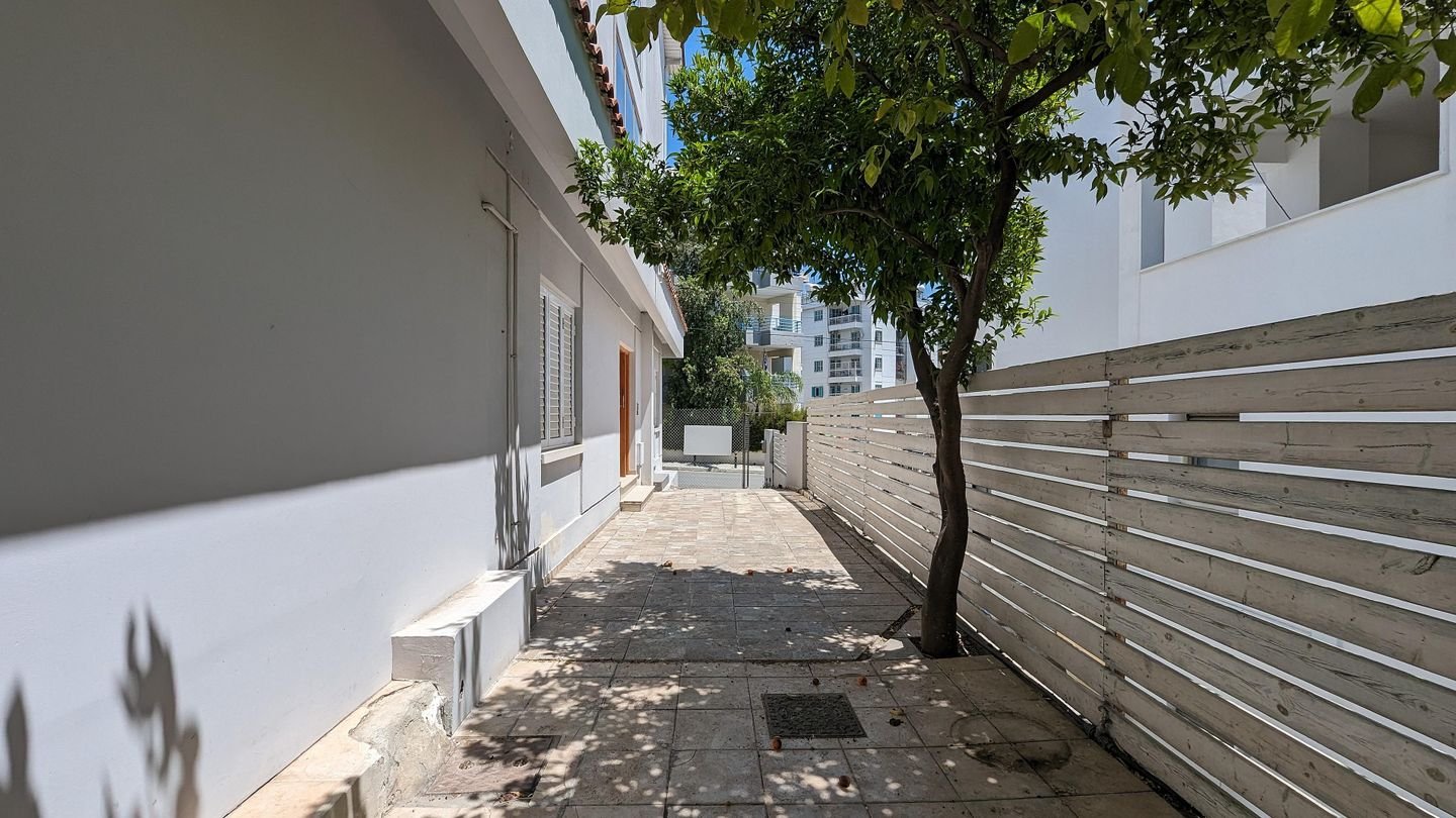 Three storey semi-detached mixed use building with shop in Strovolos, Nicosia photo 10