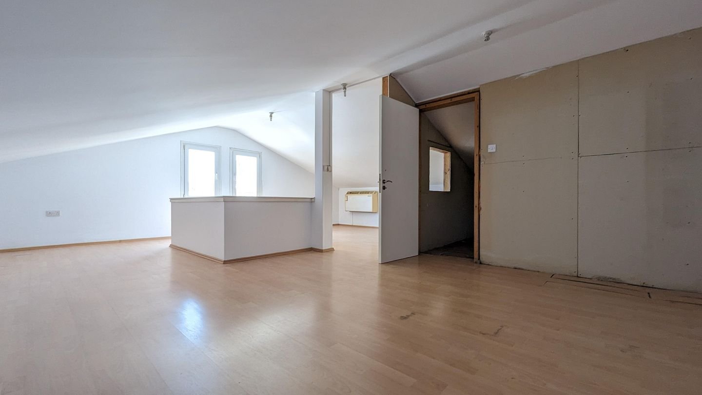 Three storey semi-detached mixed use building with shop in Strovolos, Nicosia photo 12