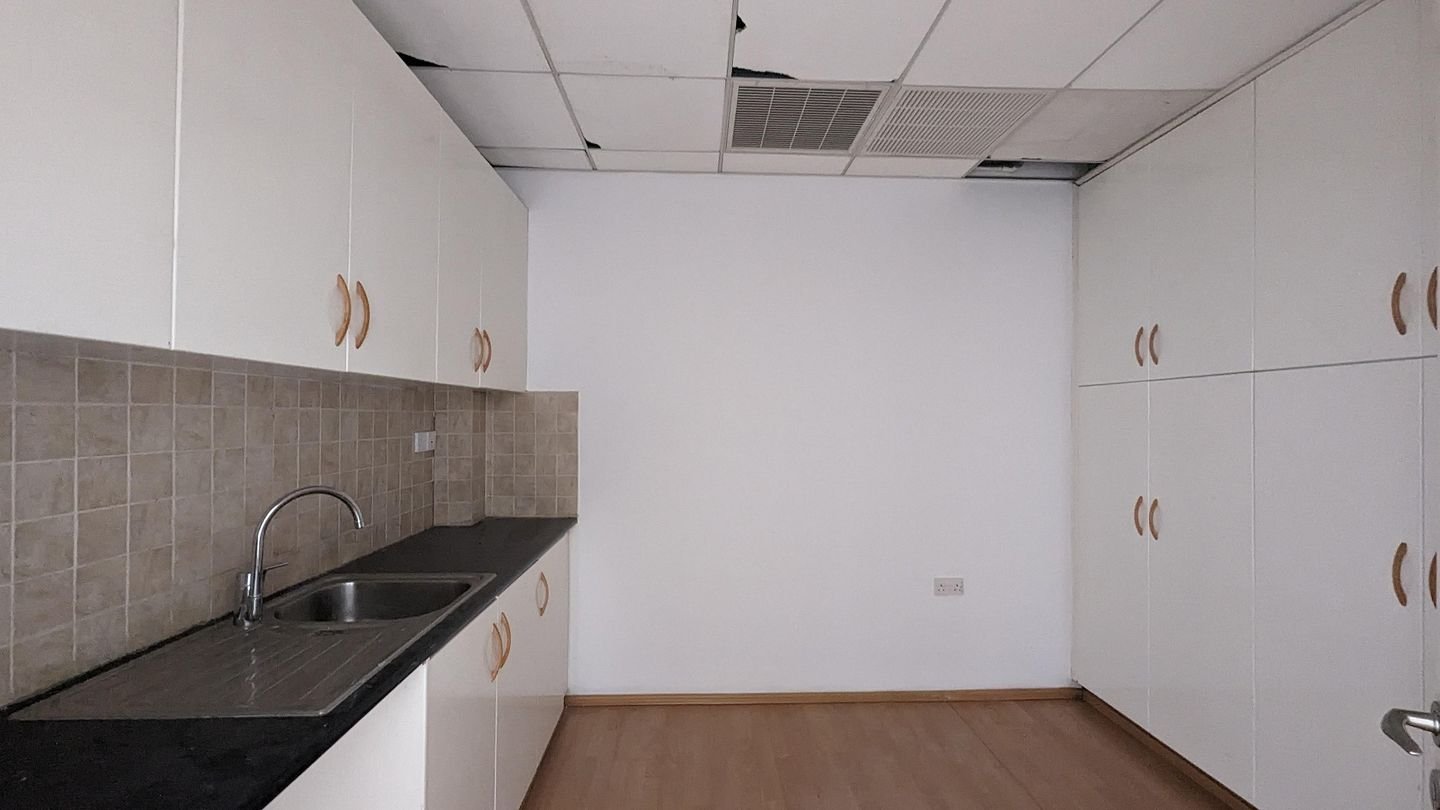 Three storey semi-detached mixed use building with shop in Strovolos, Nicosia photo 32