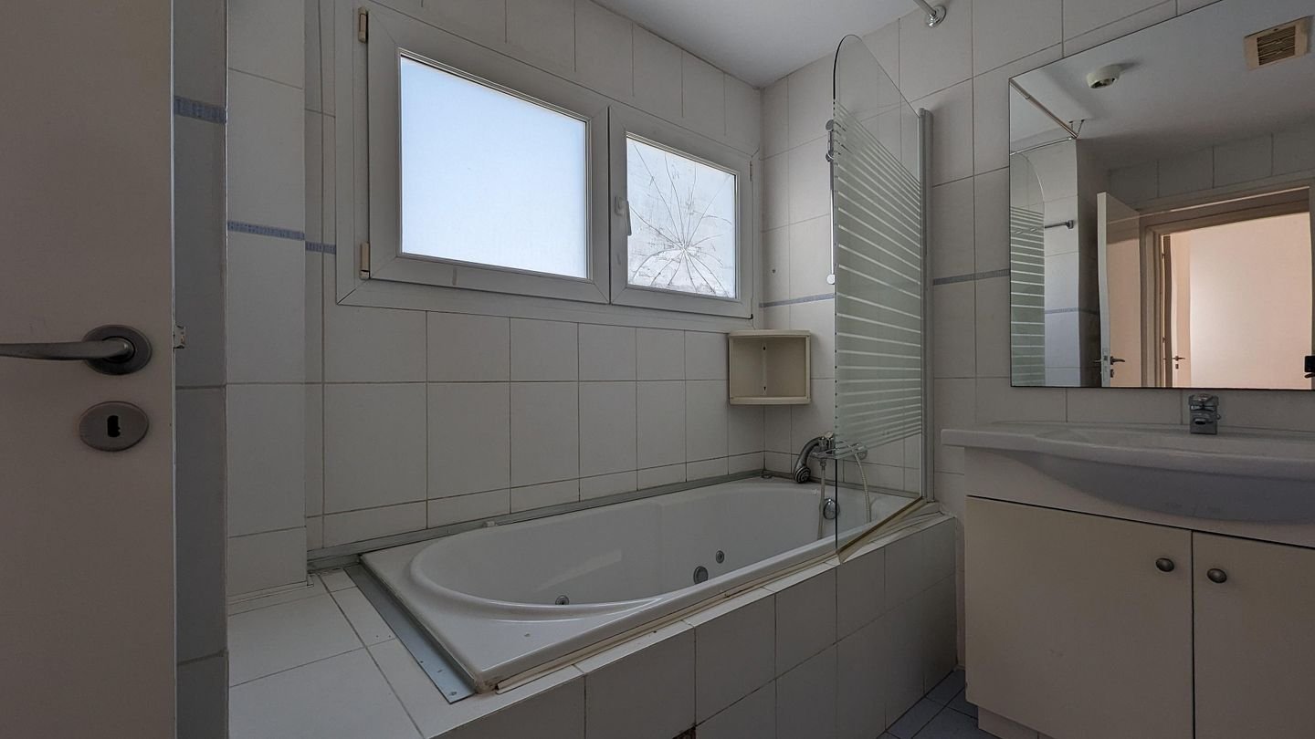 Three storey semi-detached mixed use building with shop in Strovolos, Nicosia photo 14