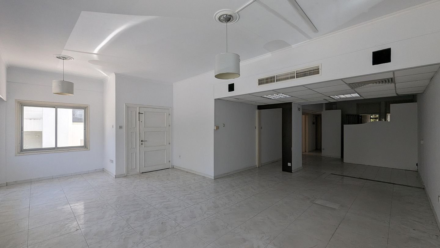 Three storey semi-detached mixed use building with shop in Strovolos, Nicosia photo 23