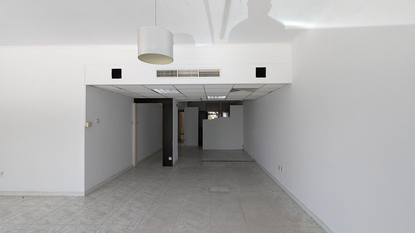 Three storey semi-detached mixed use building with shop in Strovolos, Nicosia photo 21