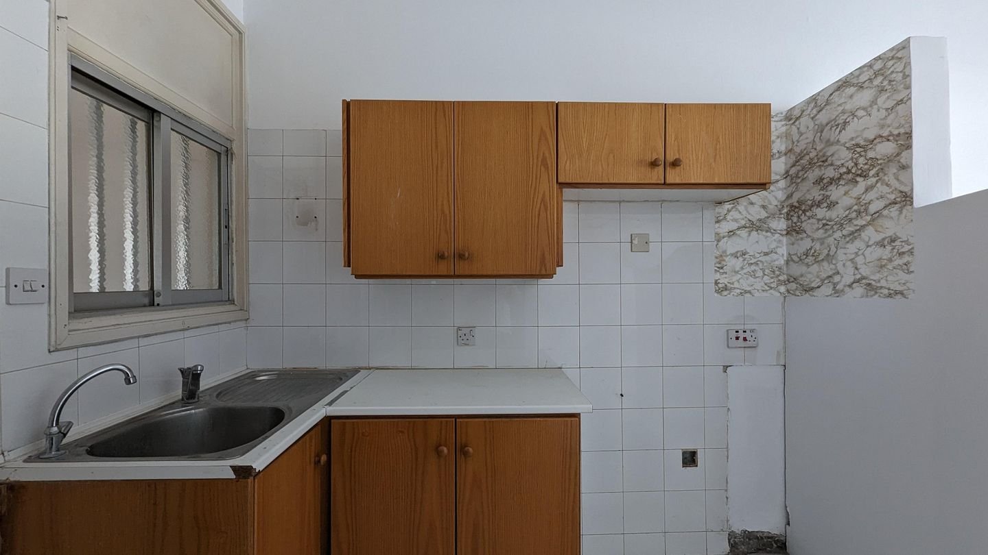 Three storey semi-detached mixed use building with shop in Strovolos, Nicosia photo 25