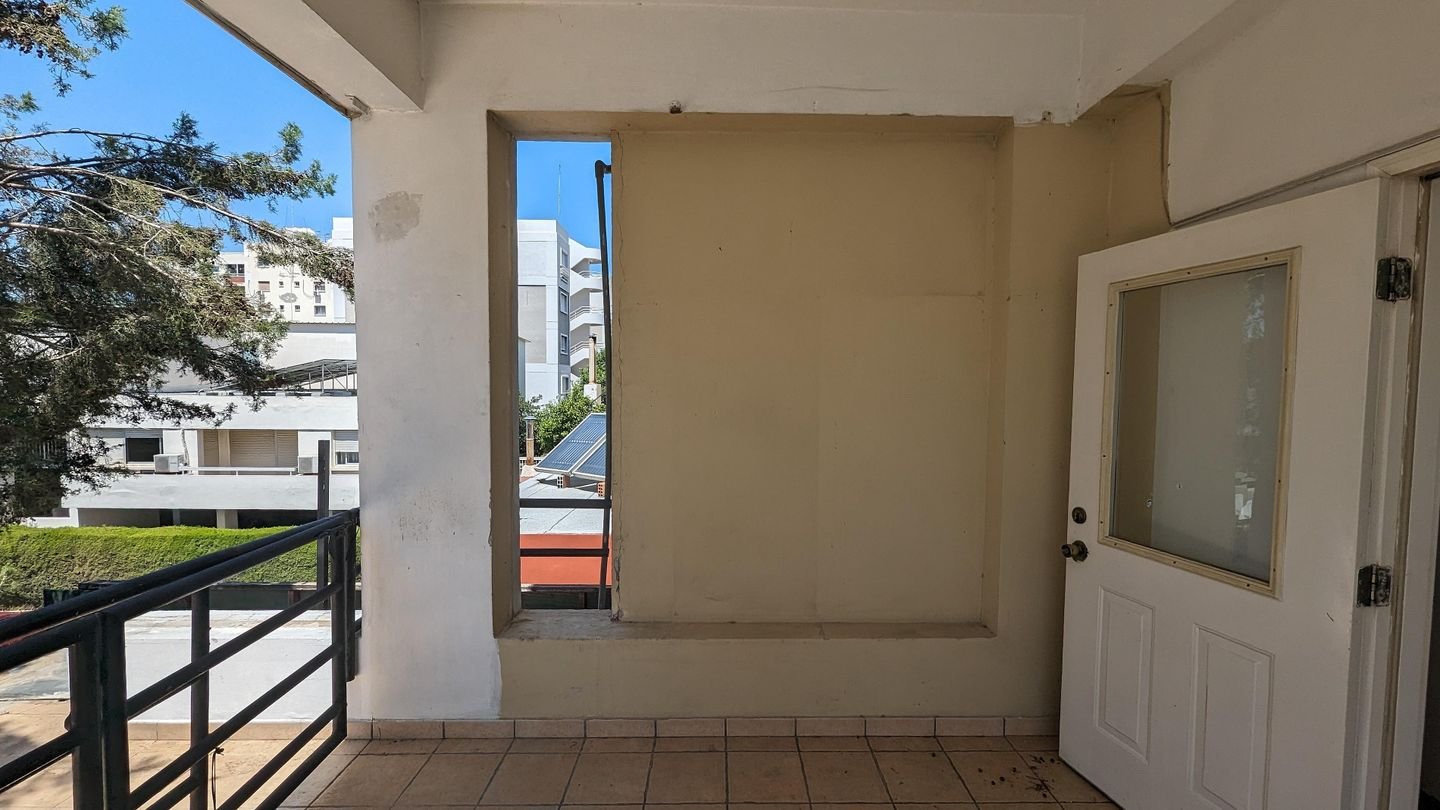 Three storey semi-detached mixed use building with shop in Strovolos, Nicosia photo 11