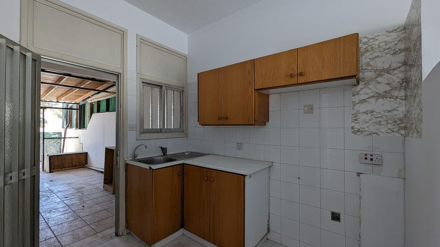 Three storey semi-detached mixed use building with shop in Strovolos, Nicosia photo 30