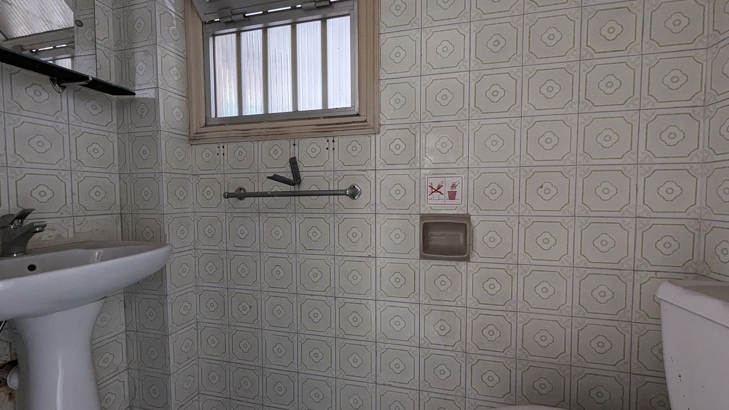 Three storey semi-detached mixed use building with shop in Strovolos, Nicosia photo 18