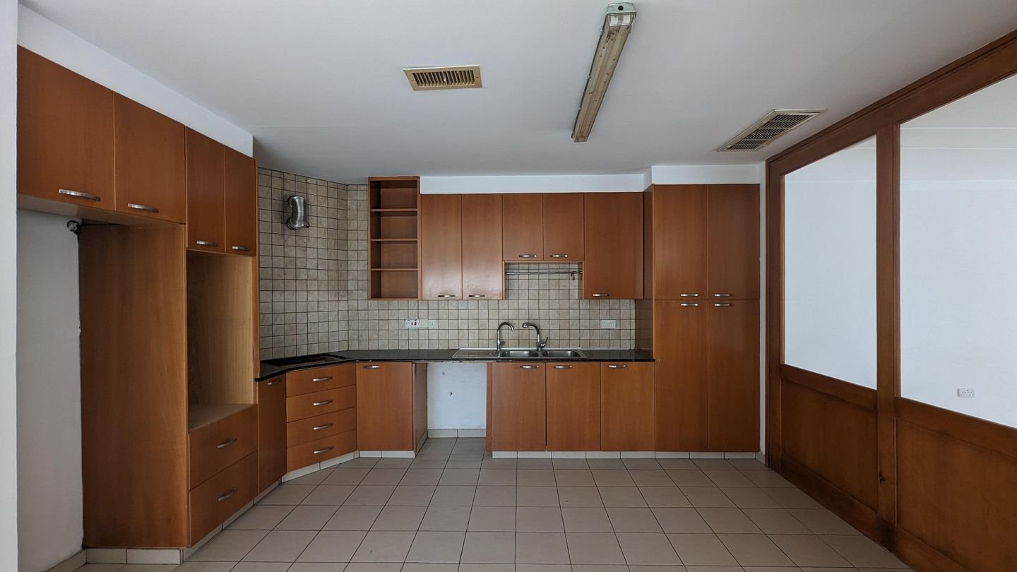 Three storey semi-detached mixed use building with shop in Strovolos, Nicosia photo 35