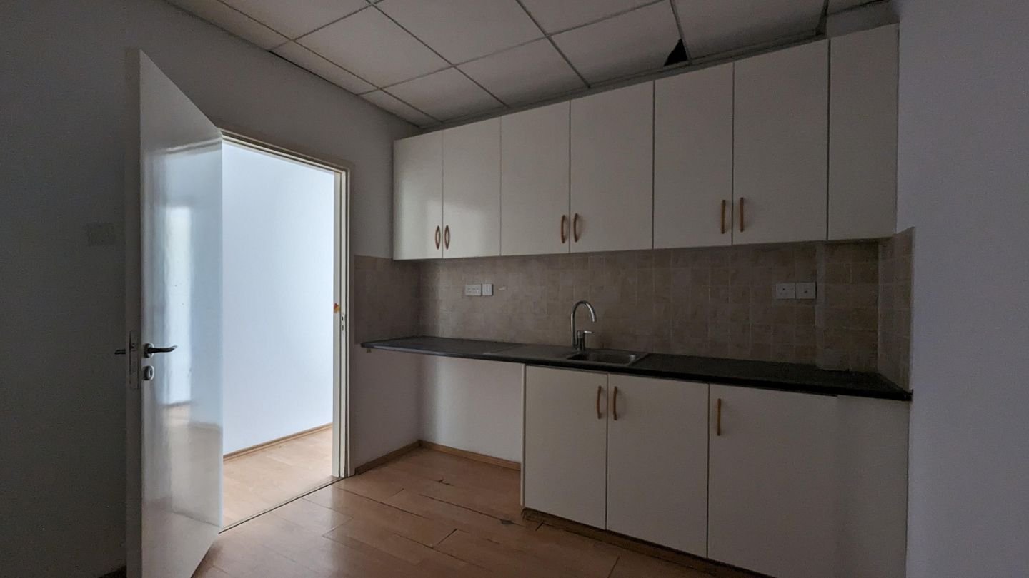 Three storey semi-detached mixed use building with shop in Strovolos, Nicosia photo 45